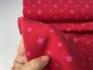 Bomuldsjersey - pinke stjerner på rød bund